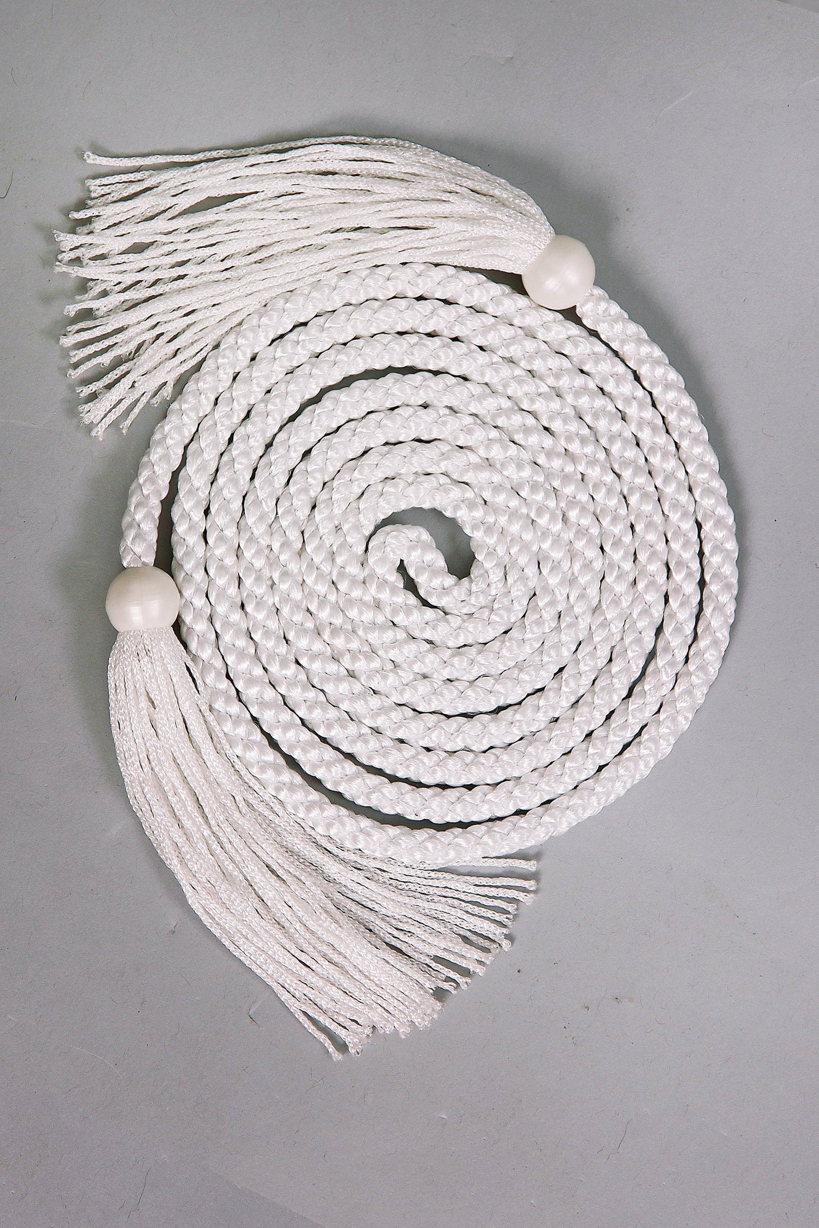 Cordons de communion colorés avec des pompons - obraz 1